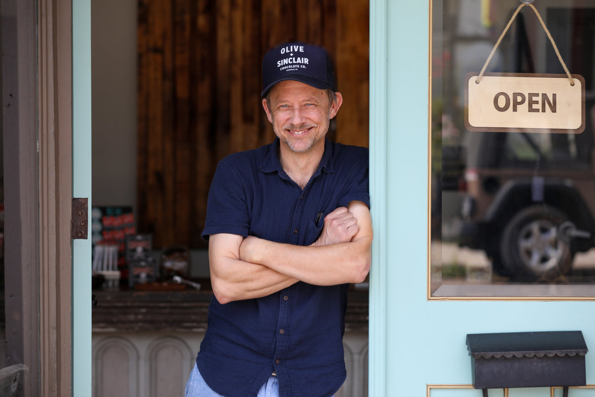 Jason - manager of Olive and Sinclair